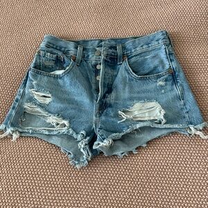 Levi’s 501 distressed high waisted shorts
